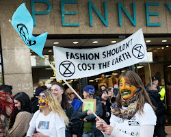 environmental activist protesting against fast fashion