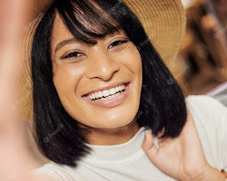 person smiling, feeling happy and content